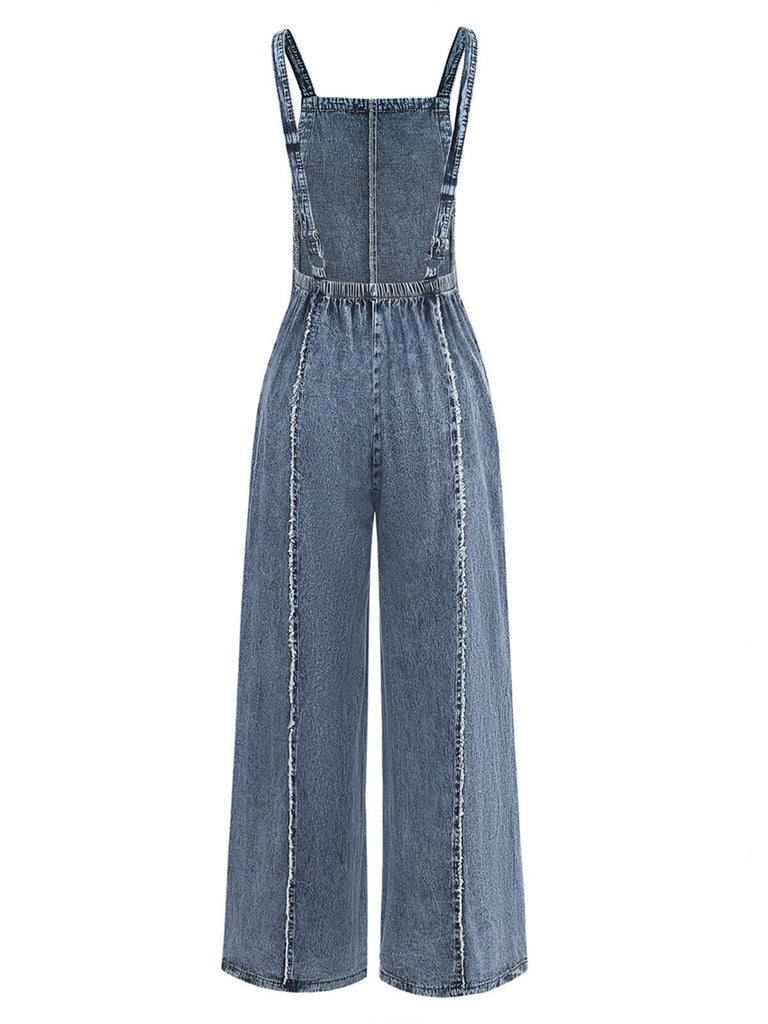 Salopette en jean bleu large effilochée années 1970