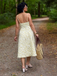 Robe midi jaune fines bretelles et imprimé floral jacquard années 1950