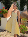Robe midi jaune fines bretelles et imprimé floral jacquard années 1950