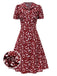 Robe marguerite à boutons revers vert des années 1950