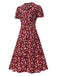 Robe marguerite à boutons revers vert des années 1950
