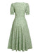 Robe verte à col en V et manches lanternes fleuries des années 1940