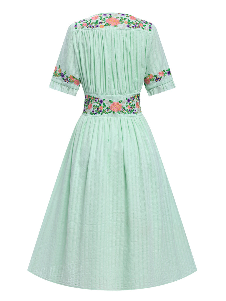 Robe fleurie brodée en coton noire à col en V des années 40