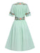 Robe fleurie brodée en coton noire à col en V des années 40
