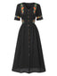 Robe fleurie brodée en coton noire à col en V des années 40