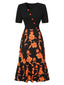 Robe patchwork florale noire à décolleté irrégulier des années 1930