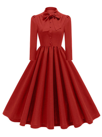 Robe trapèze boutonnée à col en nœud solide des années 1950