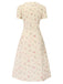 Robe beige à manches bouffantes et revers fleuris des années 1940