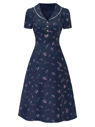 Robe bleu à manches bouffantes et revers fleuris des années 1940
