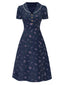Robe bleu à manches bouffantes et revers fleuris des années 1940