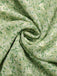 Robe verte à petites fleurs col cœur des années 1940