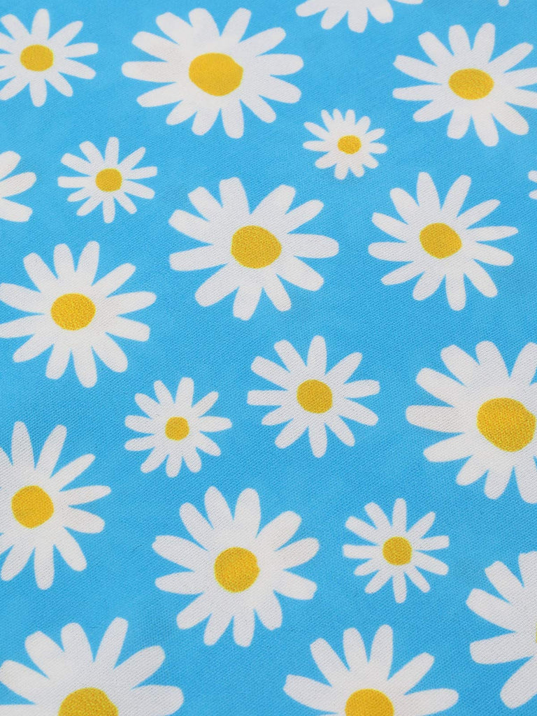 Robe dos nu marguerites bleue avec bordure en dentelle des années 1950