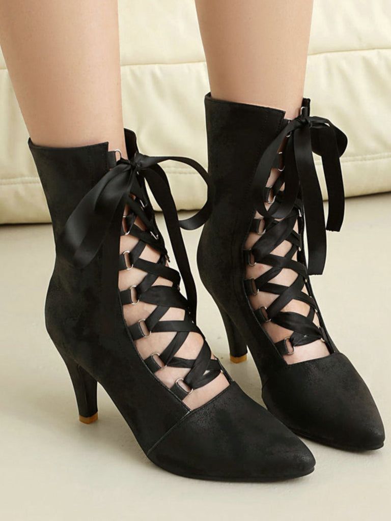 Bottes rétro à bout pointu lacées en faux daim ajouré