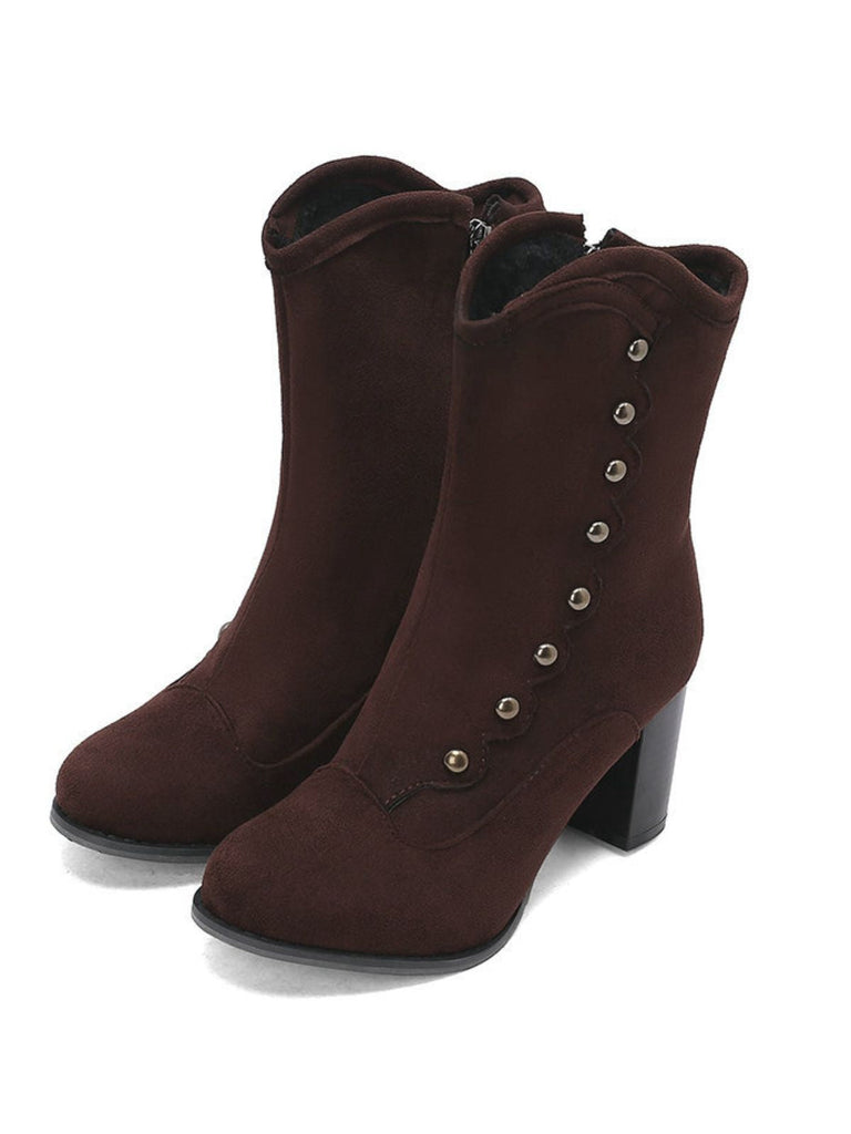 Bottes mi-mollet cloutées en daim doublées de fausse fourrure