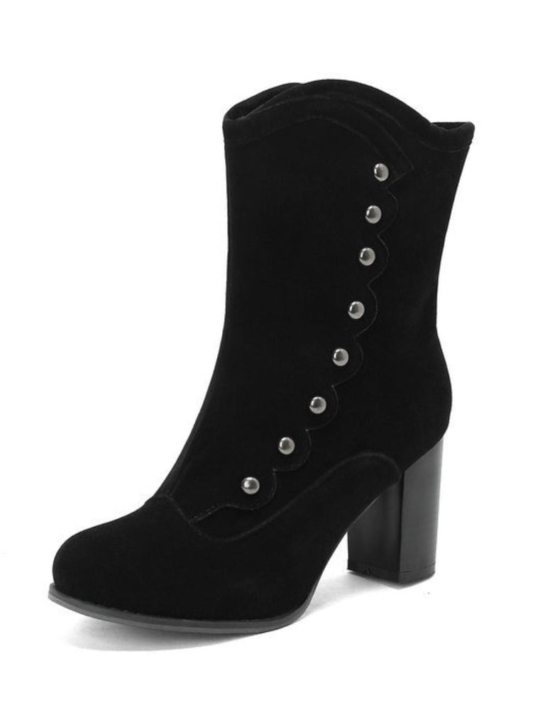 Bottes mi-mollet cloutées en daim doublées de fausse fourrure