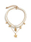 Collier chaîne superposée en perles coquillages et étoiles de mer