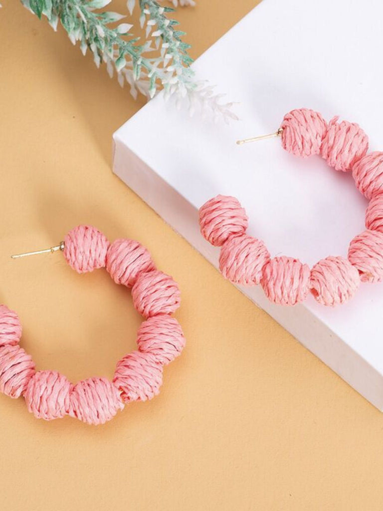 Boucles d'oreilles créoles en raphia tressé épais