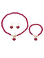 Ensemble collier bracelet et boucles d'oreilles vintage en perles en forme de cœur