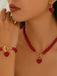 Ensemble collier bracelet et boucles d'oreilles vintage en perles en forme de cœur