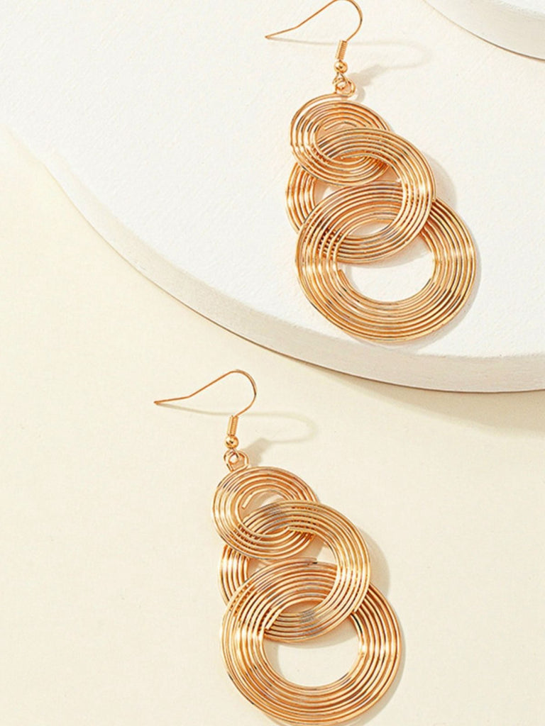 Boucles d'oreilles vintage en alliage doré à spirale exagérée