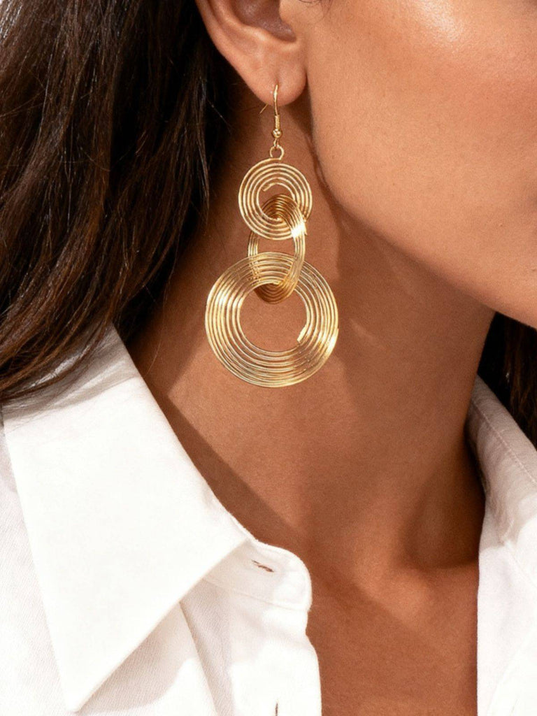 Boucles d'oreilles vintage en alliage doré à spirale exagérée