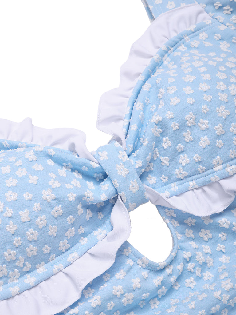 Maillot de bain une pièce bleu à volants et petites fleurs des années 1940