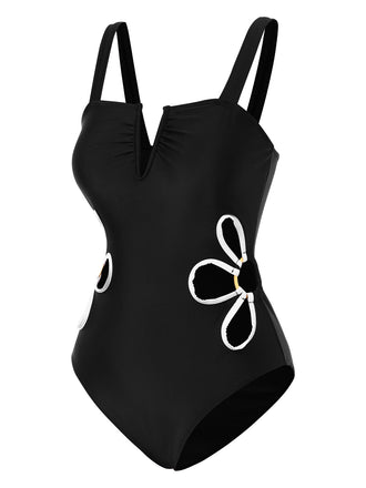 Maillot de bain une pièce noir creux à fleurs blanches des années 1950