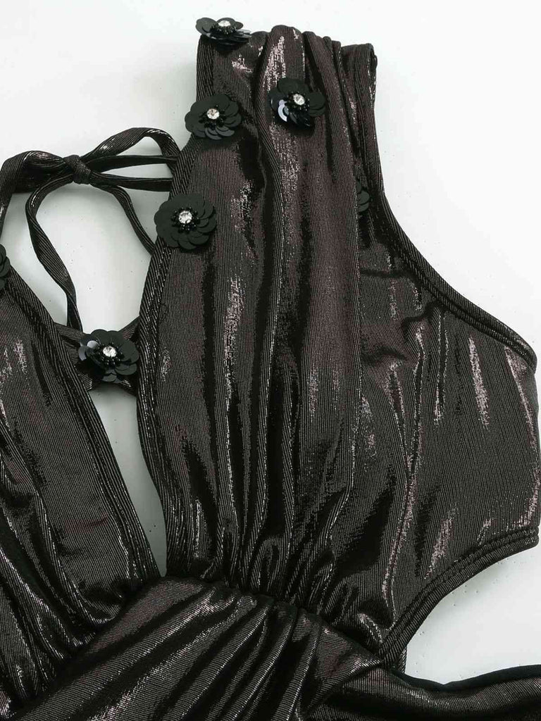 Maillot de bain une pièce noir uni brillant à appliques des années 1970