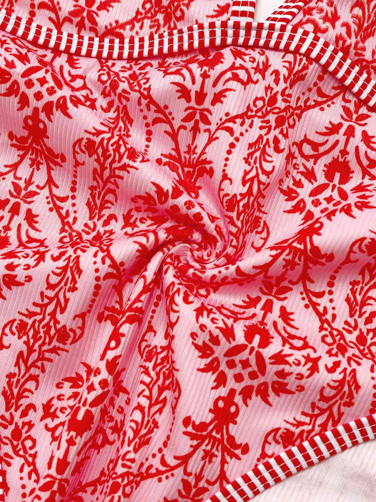 Maillot de bain rouge col V profond dos nu motifs baroques années 1970