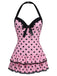 Maillot de bain une pièce noir à pois et nœud des années 1940