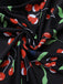 Maillot de bain noir à col en V et nœud cerise des années 1950