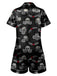 Pyjama noir à revers avec tête de mort et roses des années 1970