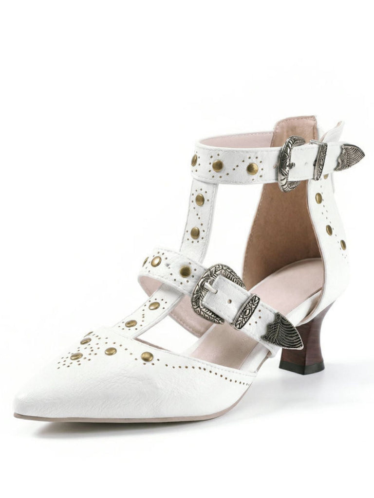 White shoe with decorative straps and buckles on a white background