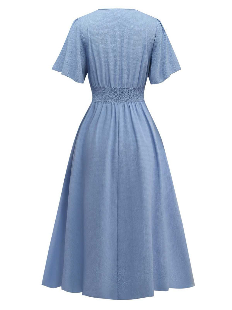 Robe noire manches volants froncée fendue col V années 1940