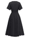 Robe noire manches volants froncée fendue col V années 1940