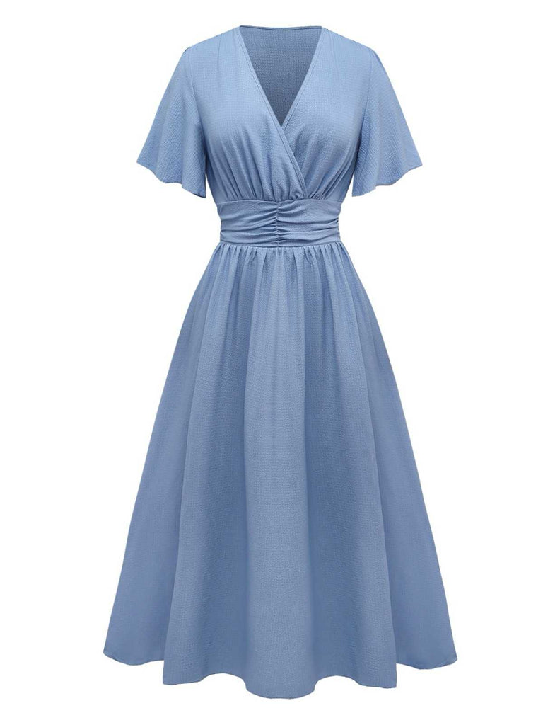 Robe noire manches volants froncée fendue col V années 1940
