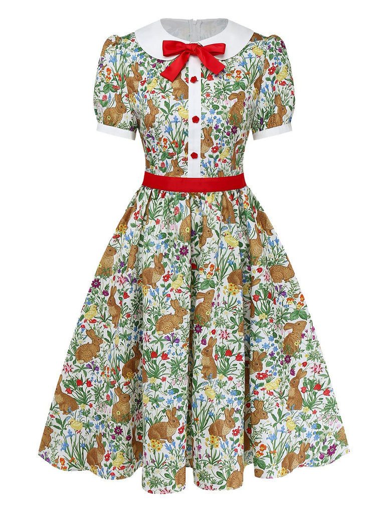 Front studio view of the bunny print dress highlighting the red waist cincher and button-down bodice.