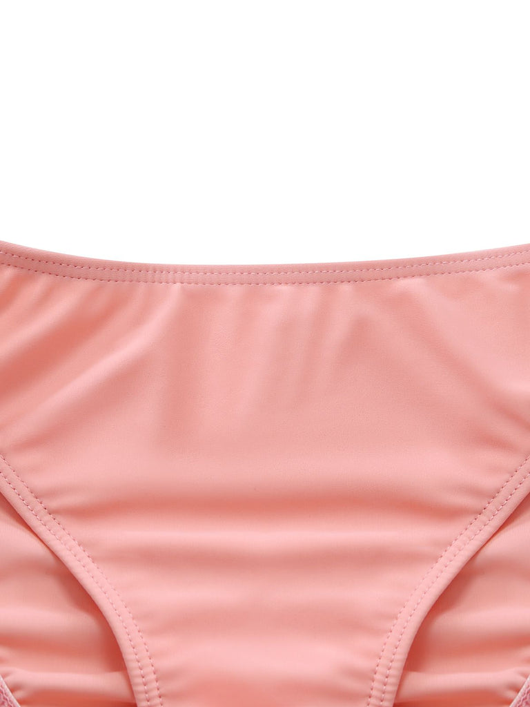Close-up of the high-waisted pink bikini bottoms featuring a smooth, comfortable fit.