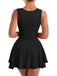 Rear view of a model wearing the black tiered mini dress, showcasing the high-back sleeveless design.