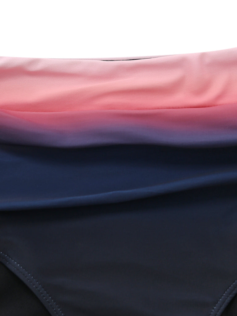 Close-up of the bikini fabric showcasing the smooth color transition from soft pink to deep navy blue.