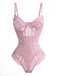 Front studio shot of the pink lace bodysuit highlighting the intricate floral embroidery and cut-out details at the bust.