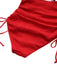 Red crumpled fabric with strings on a white background