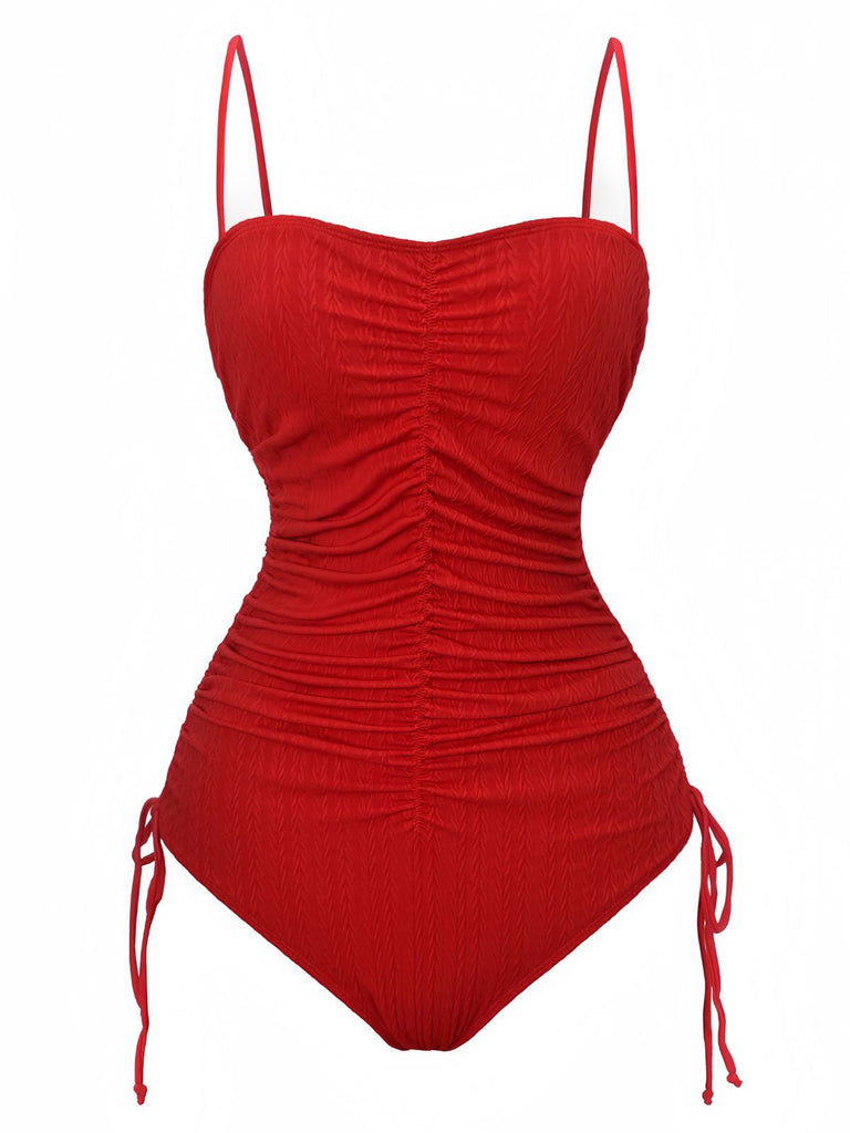 Red swimsuit with thin straps on a white background