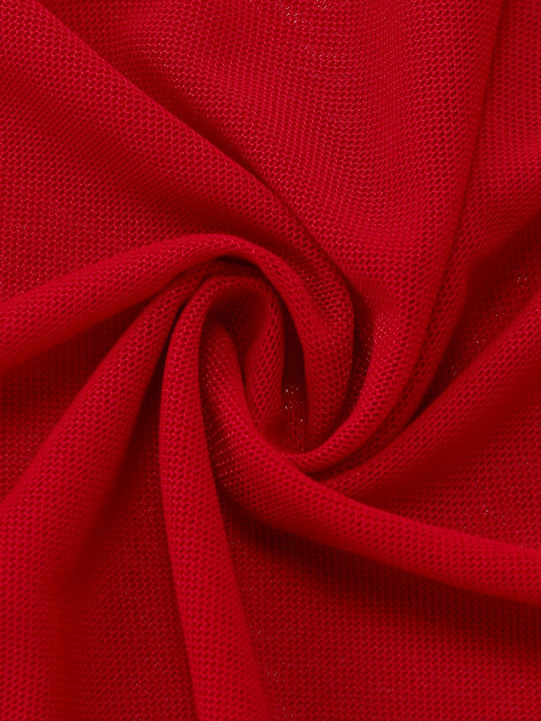 Close-up of red fabric with a textured pattern