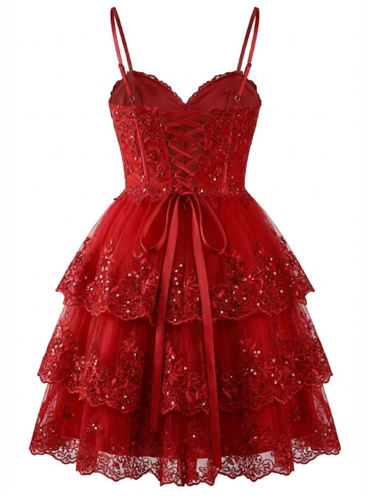 Studio front view of the red lace party dress highlighting the spaghetti straps and layered mesh skirt.