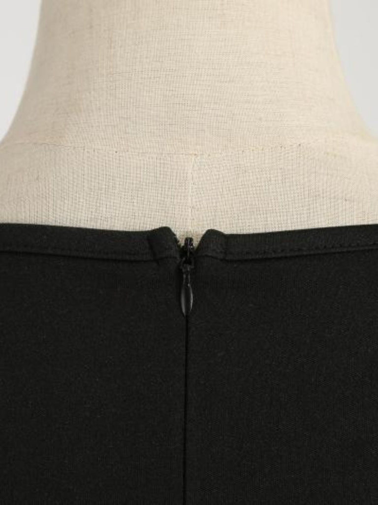 Robe verte de Noël à motif Père Noël et col V festonné Années 1950 - 9