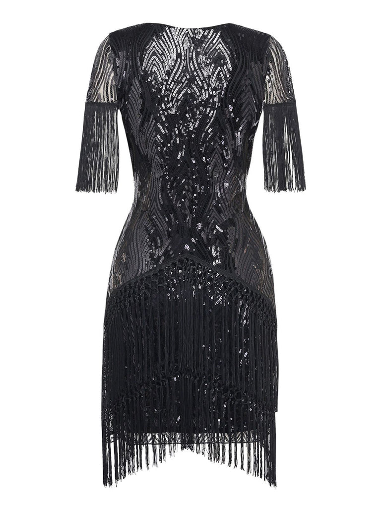Back view of the shimmering black sequin evening dress, showcasing its elegant V-neckline and tiered fringe.