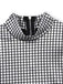 Black and white checkered fabric with a zipper in the center on a white background