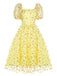 Robe trapèze jaune à fleurs 3D et manches bouffantes