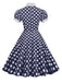 Robe trapèze à pois et col chemise des années 1950